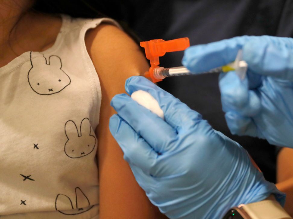 caption: The CDC is removing recommendations that children and pregnant people get the COVID vaccine.