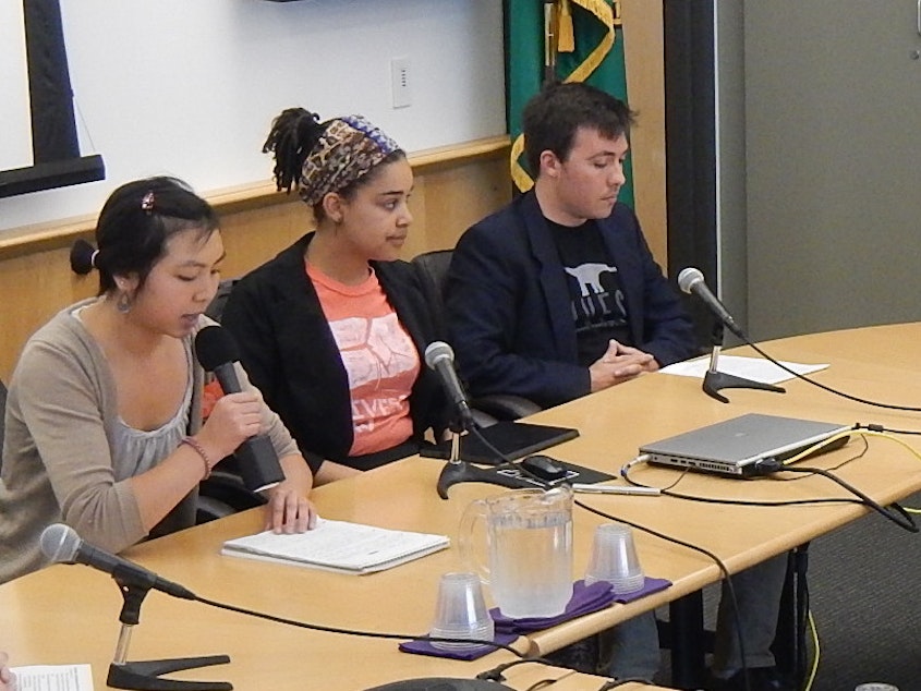 caption: Student activists Angela Feng, Sarra Tekola and Alex Lenferna of Divest UW appear before the UW Board of Regents on March 12, 2015 to urge the university to get rid of its coal investments.
