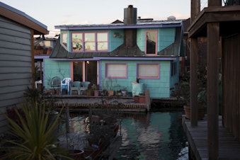 caption: A houseboat is shown on Tuesday, January 30, 2018, off of Fairview Avenue East in Seattle.