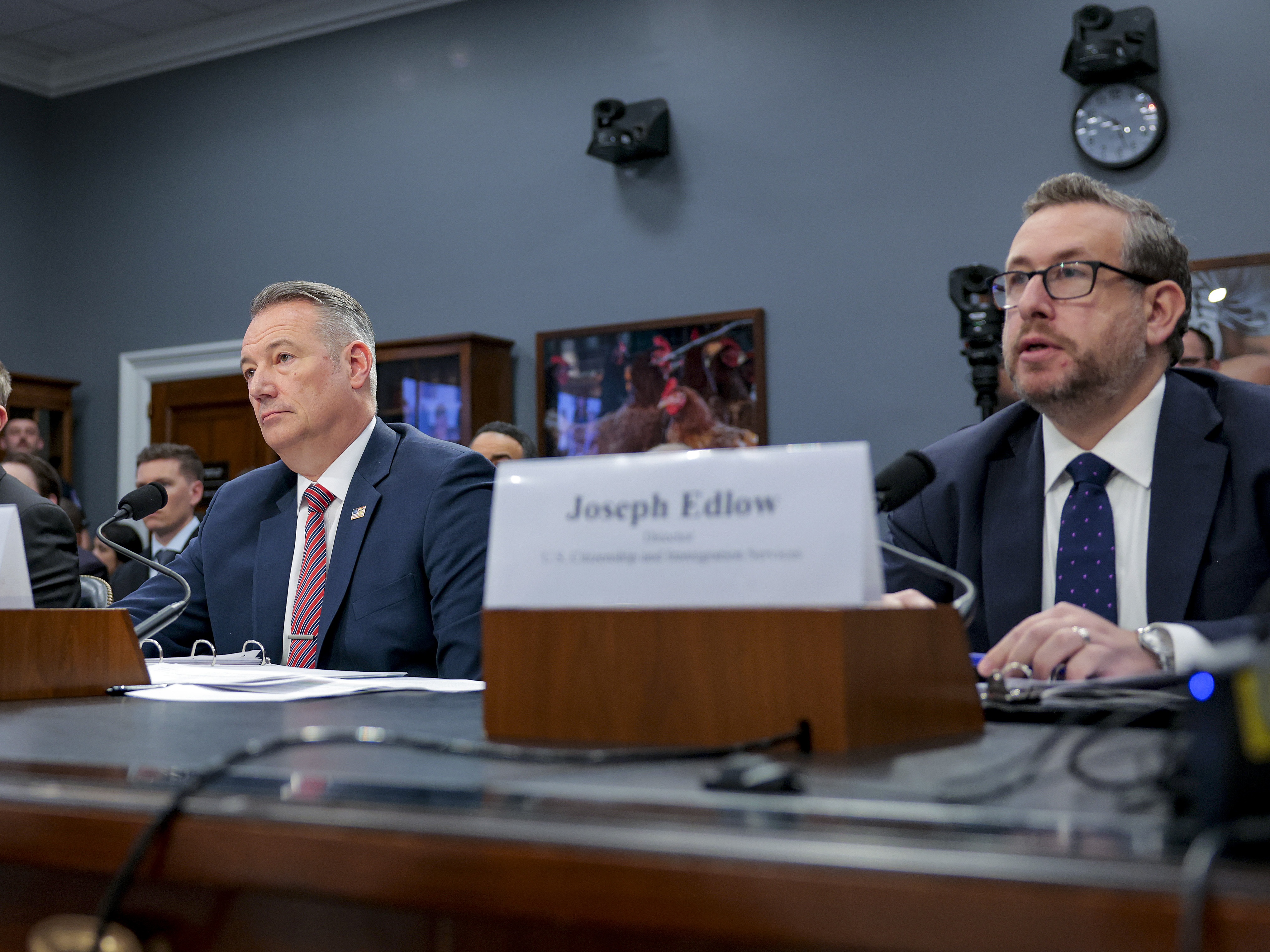 caption: Rodney Scott (L), commissioner of U.S. Customs and Border Protection, Todd Lyons (C), acting director of Immigration and Customs Enforcement, and Joseph Edlow (R), director of US Citizenship and Immigration Services, testify before a House appropriations subcommittee on April 16 in Washington, D.C.