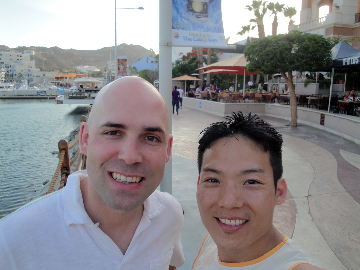 caption: Helicopter crash victim Richard Newman and his husband, Daniel Jung, in 2013.