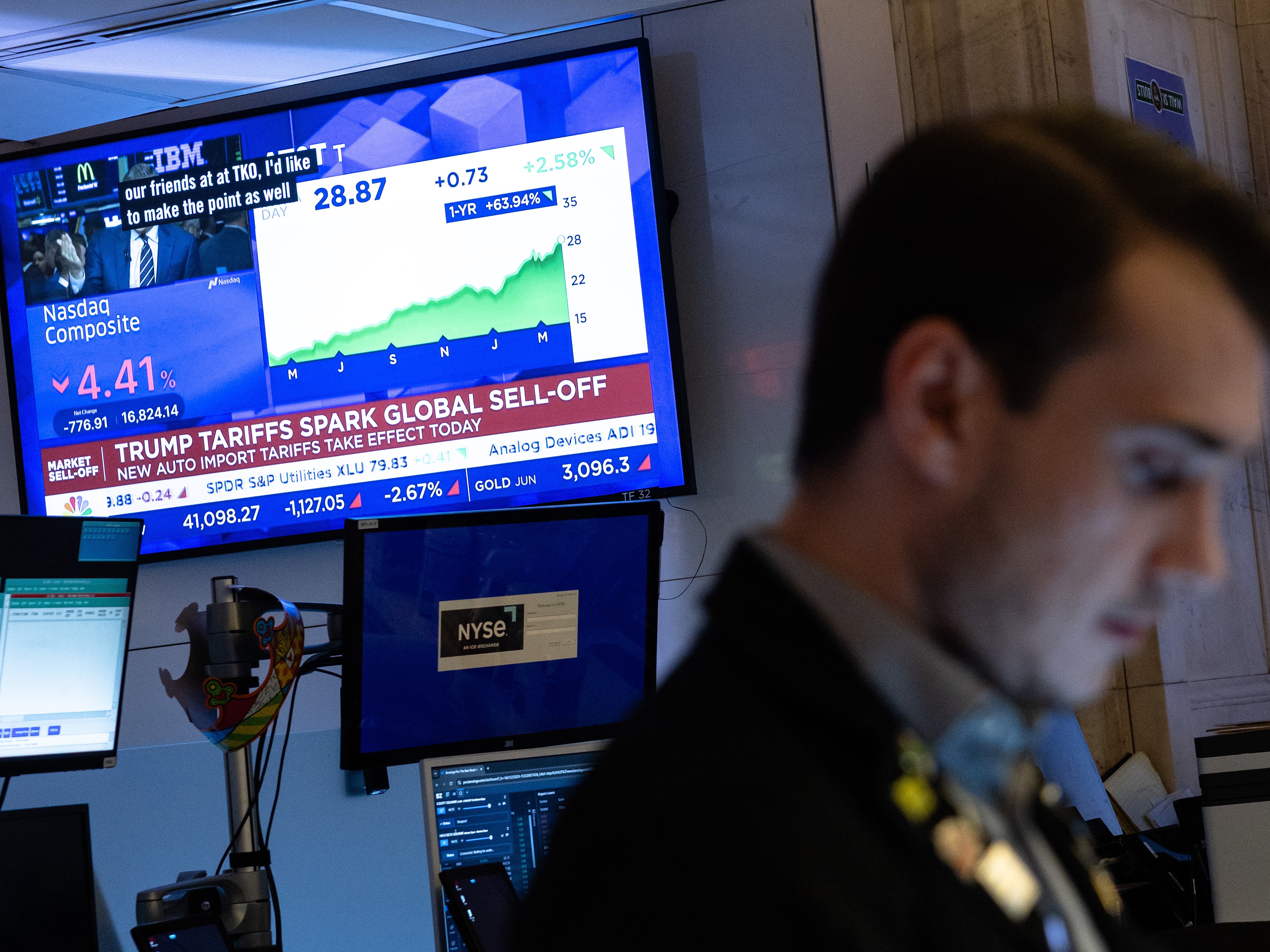 caption: Traders work on the floor of the New York Stock Exchange on Thursday, which saw the worst markets selloff in five years.