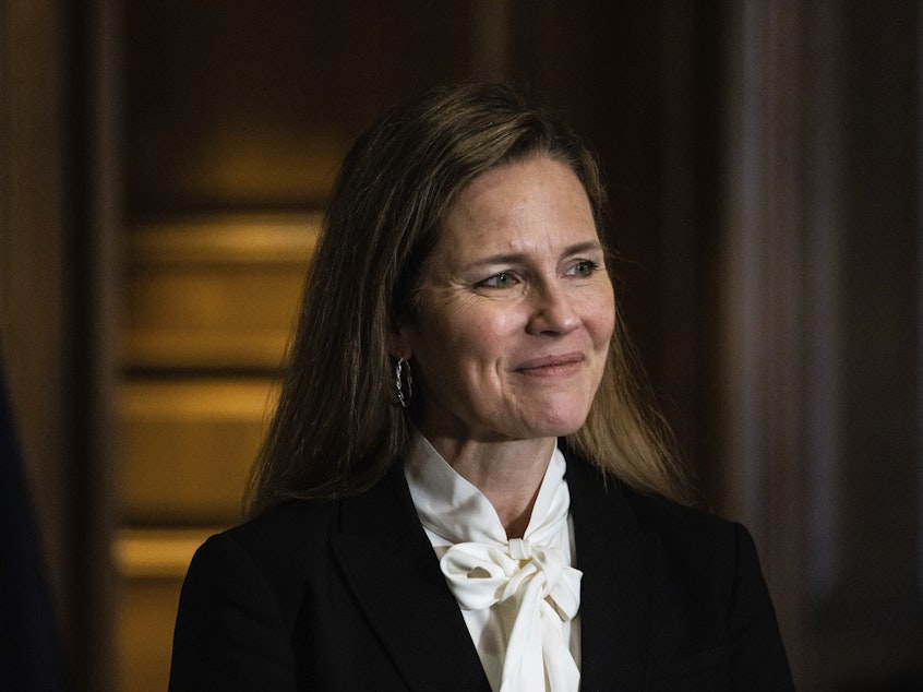 caption: Judge Amy Coney Barrett, President Donald Trump's nominee for the U.S. Supreme Court, meets with Sen. Deb Fischer, R-Neb., on Capitol Hill ahead of her confirmation hearings.