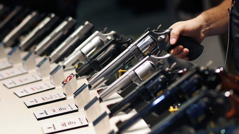 caption: Handguns are displayed at a trade show in Las Vegas. The Supreme Court is granting a case on gun rights for the first time since 2010. CREDIT: JOHN LOCHER/AP