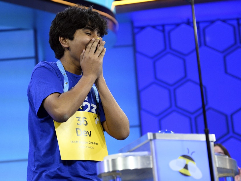 caption: Dev Shah, 14, from Largo, Fla., reacts as he wins the Scripps National Spelling Bee finals, Thursday, June 1, 2023, in Oxon Hill, Md.