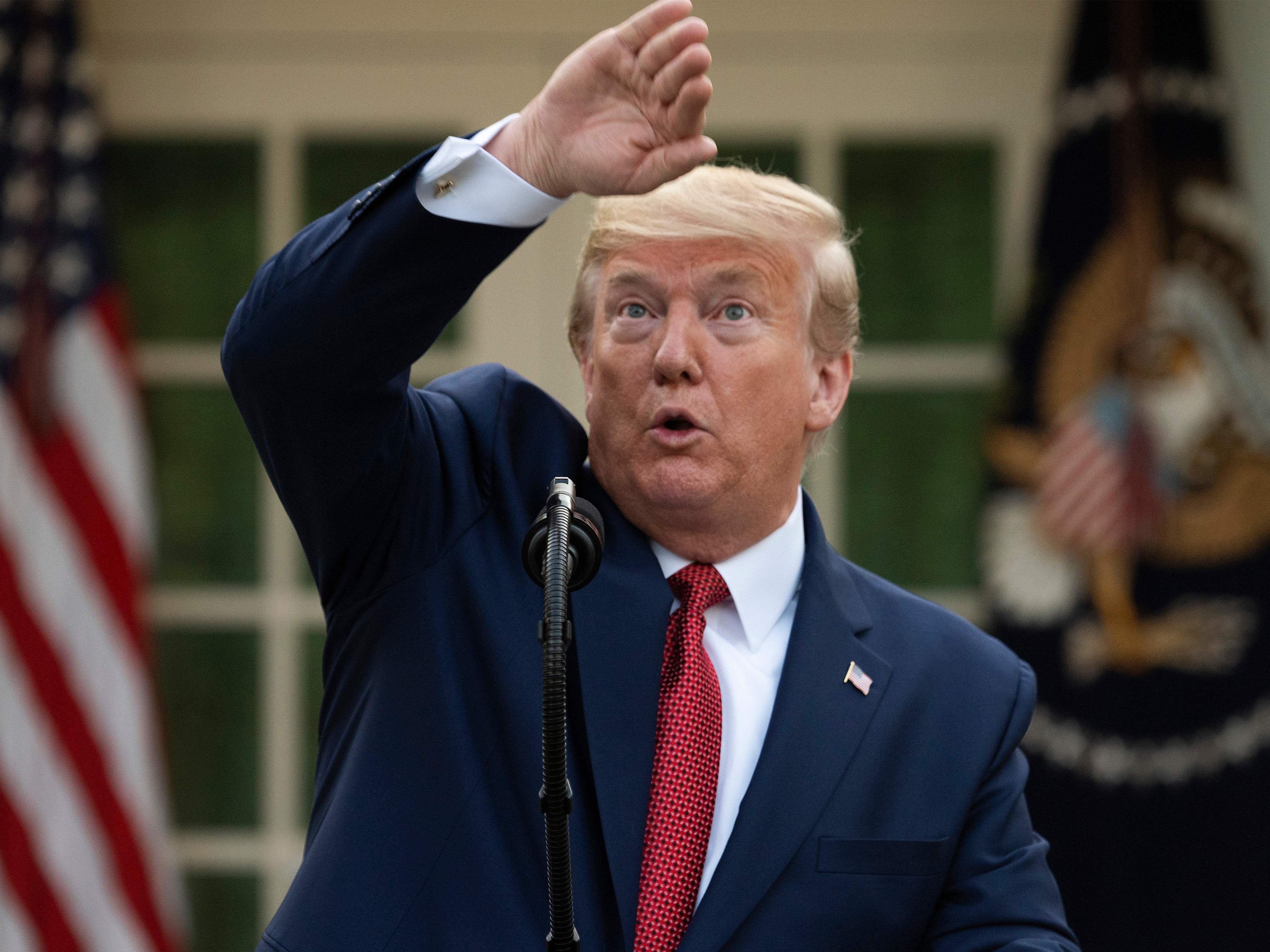 caption: President Trump on Sunday described models showing U.S. coronavirus cases could peak in two weeks — at Easter — a time when he had hoped things would be back to normal for parts of the country.