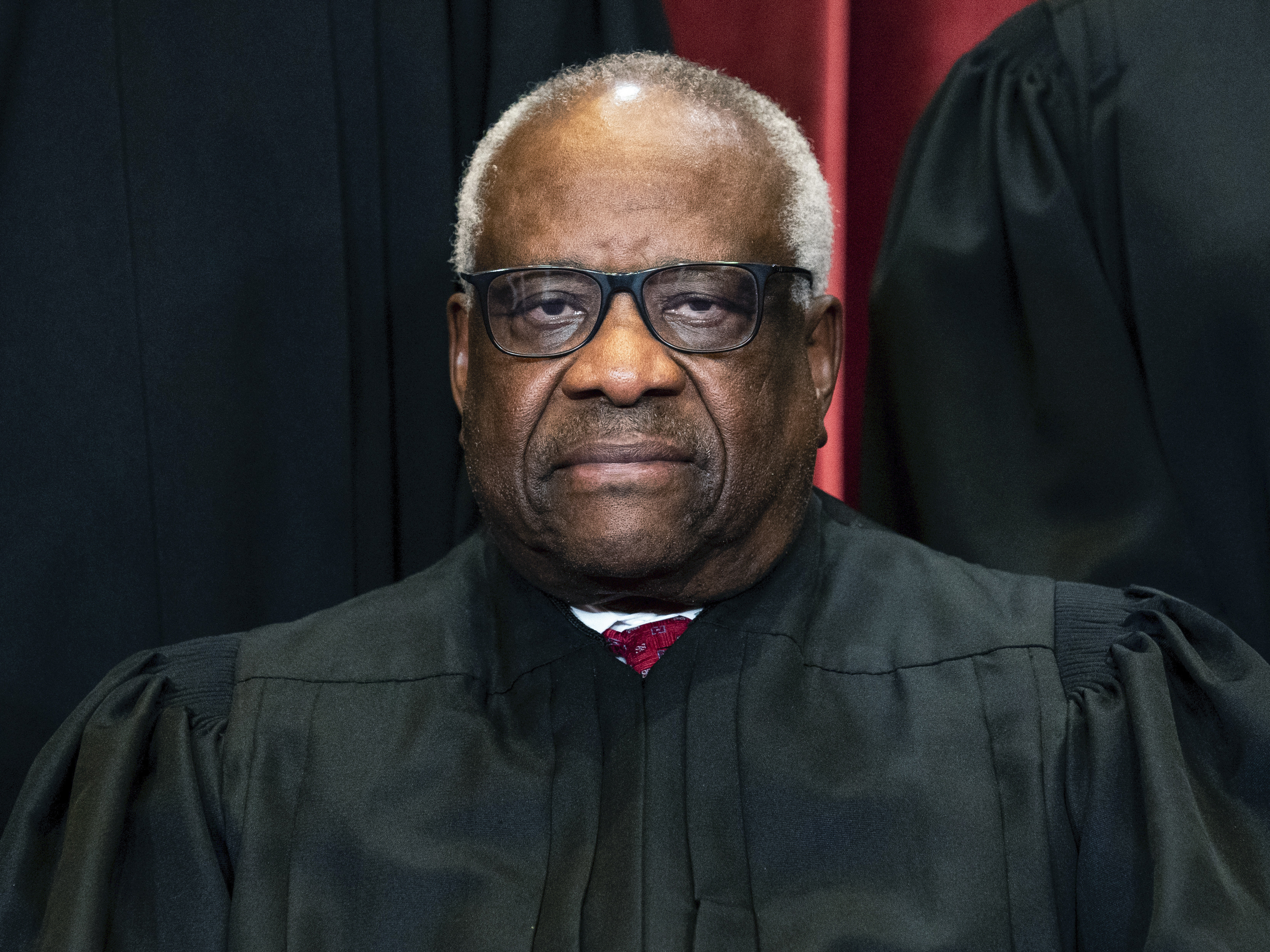 caption: Following the Supreme Court's decision to overturn <em>Roe v. Wade</em>, the George Washington University law school received calls to drop Justice Clarence Thomas and cancel the seminar he taught.