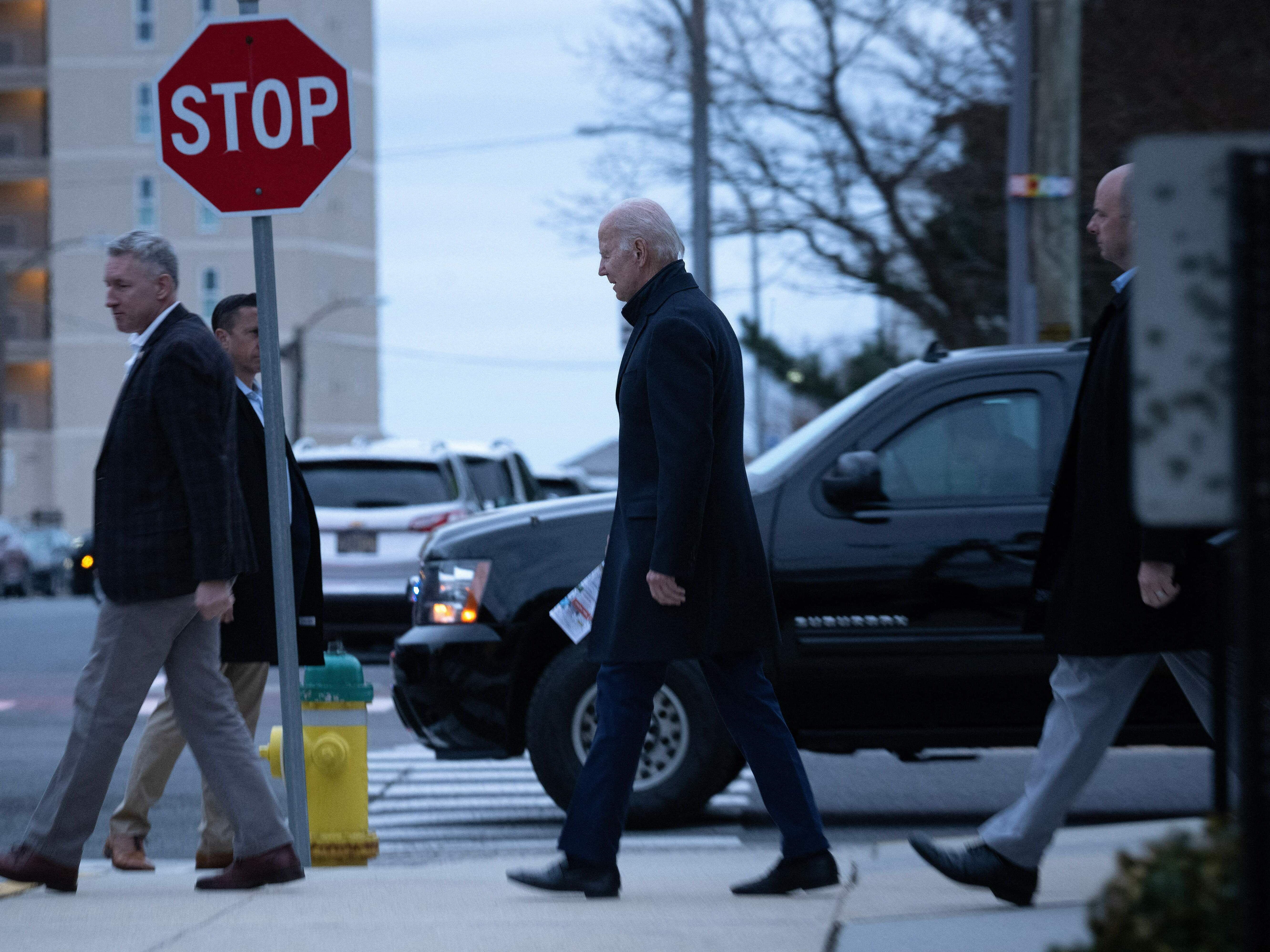 caption: President Biden leaves Saint Edmond Catholic Church in Rehoboth Beach, Del. after attending mass on Jan. 21.