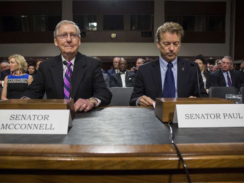 caption: Prosecutors say Senate Majority Leader Mitch McConnell of Ky., left, and Sen. Rand Paul, R-Ky. were two targets of a doxing scheme in which a former Senate staffer hacked into government computers to expose the personal information of lawmakers.