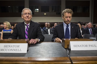 caption: Prosecutors say Senate Majority Leader Mitch McConnell of Ky., left, and Sen. Rand Paul, R-Ky. were two targets of a doxing scheme in which a former Senate staffer hacked into government computers to expose the personal information of lawmakers.