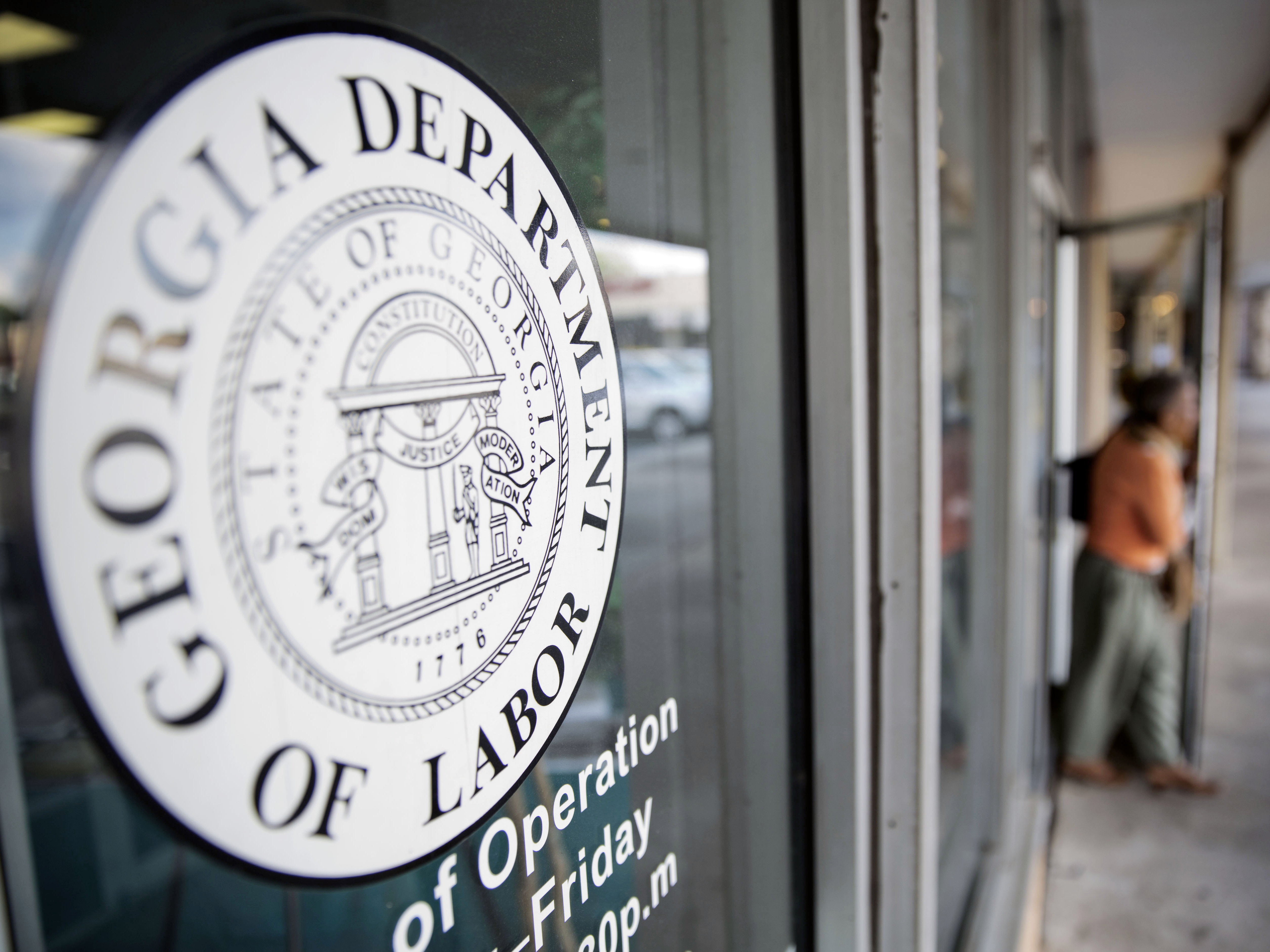 caption: Kersha Cartwright, a spokeswoman for the Georgia Department of Labor, said the office "is encouraging employees to work with their employers on a safe return-to-work plan."