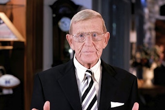 caption: Former Notre Dame football coach Lou Holtz speaks from Orlando, Fla., during the third night of the Republican National Convention on Wednesday. Holtz questioned Democratic candidate Joe Biden's Catholic faith.