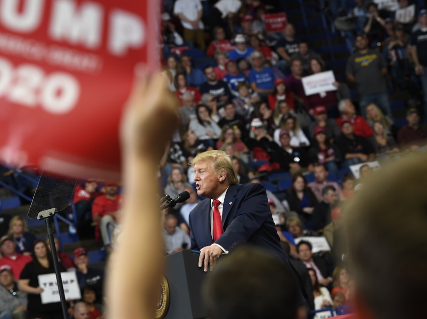 caption: President Trump speaks during a campaign rally in Lexington, Ky., Monday. His efforts don't appear to have been enough to carry incumbent GOP Gov. Matt Bevin over the finish line.