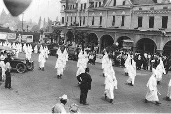 caption: A Ku Klux Klan rally in Oregon (estimated 1920s)