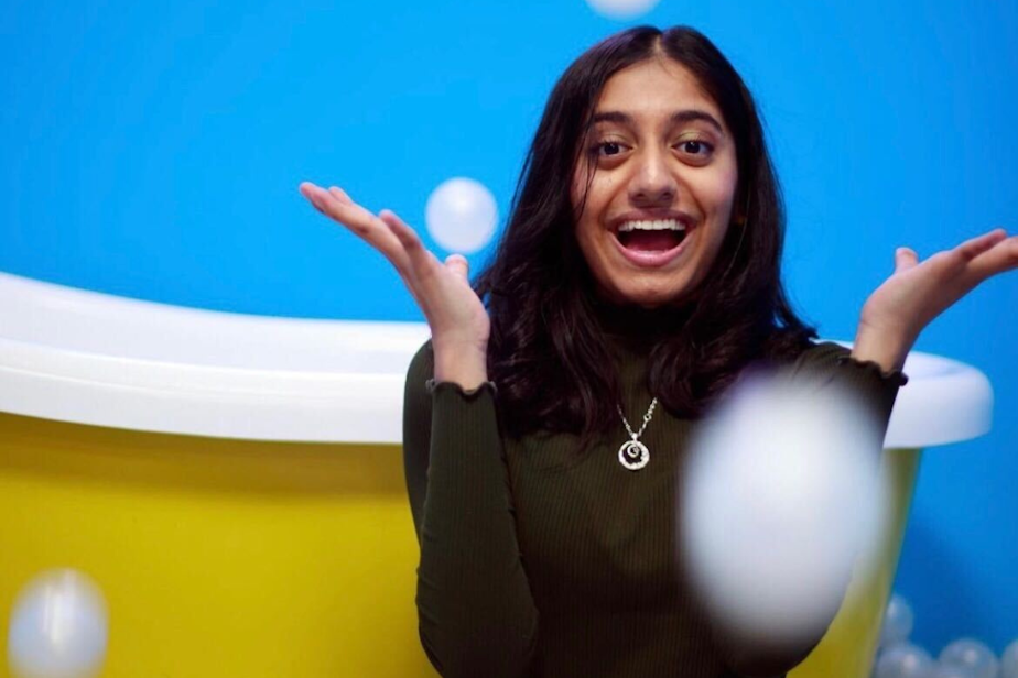 caption: Aparna Srinivasan poses for a portrait.