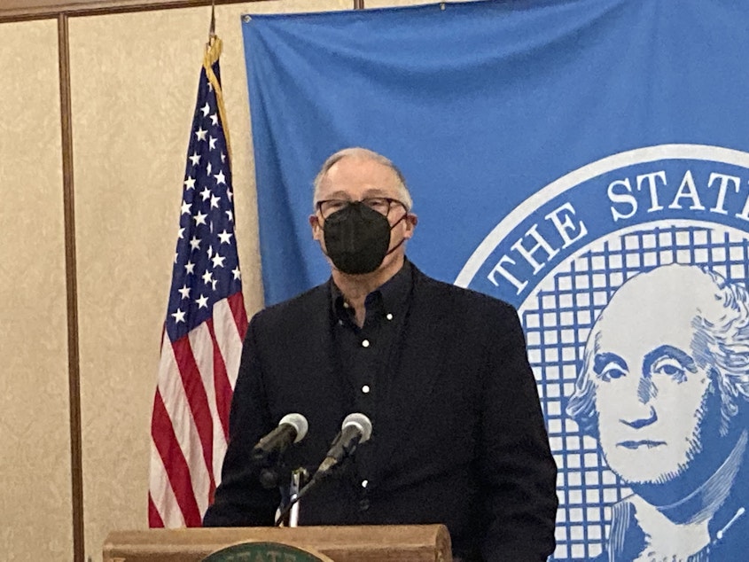 caption:  Gov. Jay Inslee says he would support a short-term delay in the implementation of a new payroll tax to fund a first-in-the-nation long-term care benefit program called WA Cares Fund. 