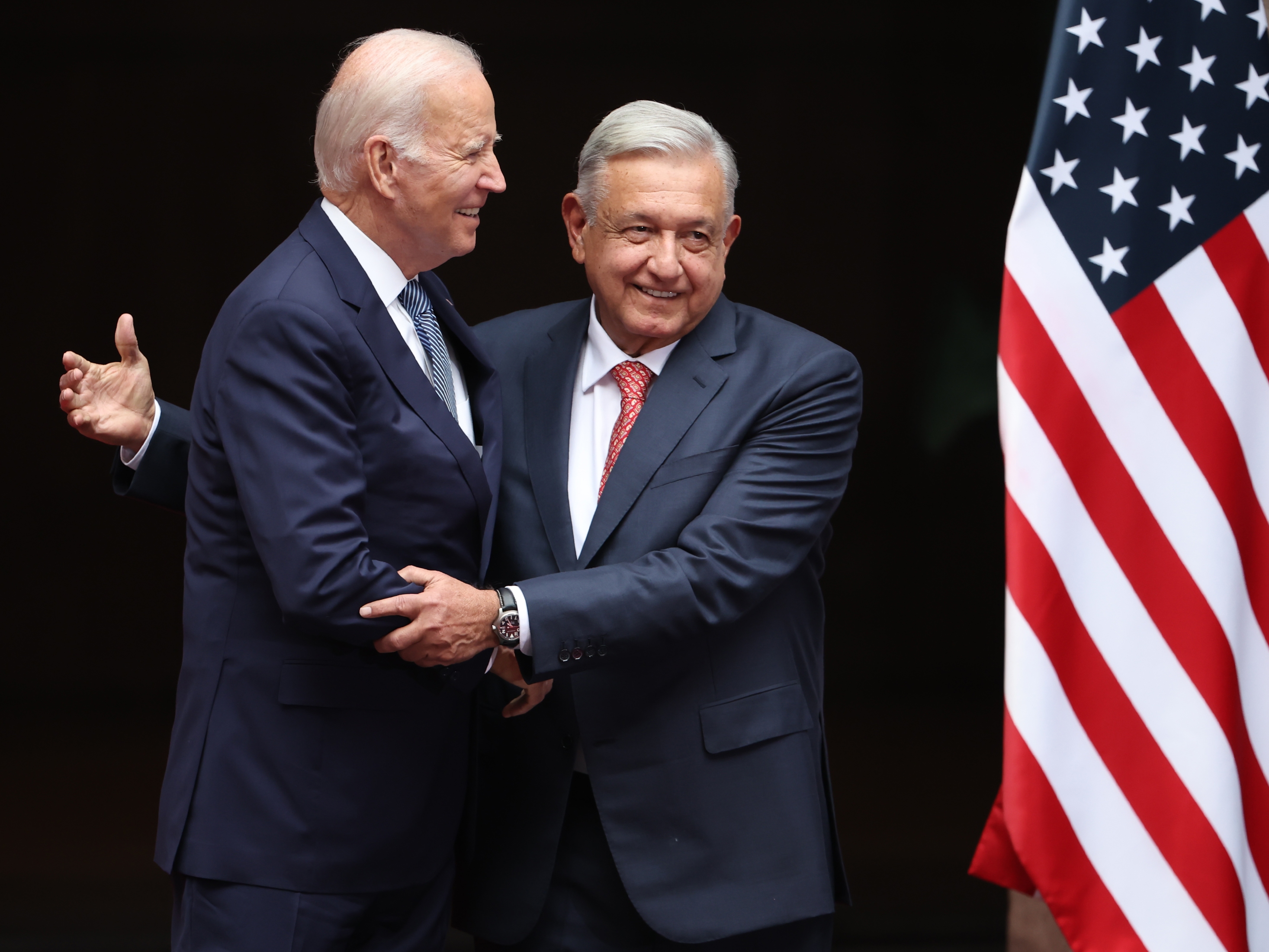 caption:  U.S. President Joe Biden greets President of Mexico Andres Manuel Lopez Obrador during a welcome ceremony as part of the '2023 North American Leaders' Summit at Palacio Nacional on January 09, 2023 in Mexico City, Mexico. <br/>