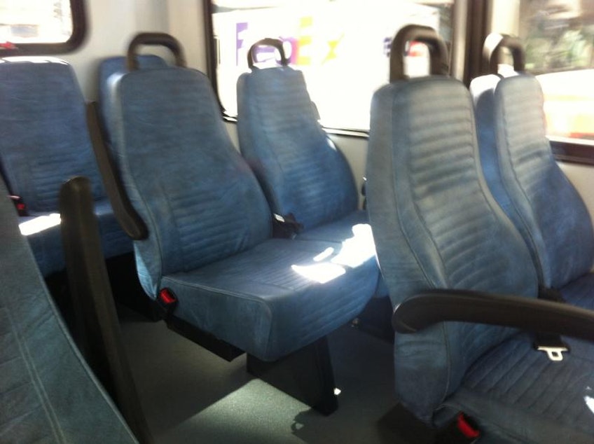 caption: Lots of empty seats on the first day of Metro's free downtown shuttle.