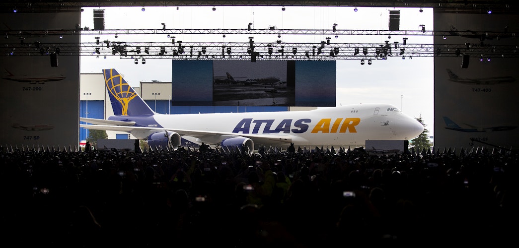caption: The factory doors opened to display the last 747 to thousands of guests who had gathered for the celebration on Tuesday, January 31, 2023, at Boeing’s factory in Everett.