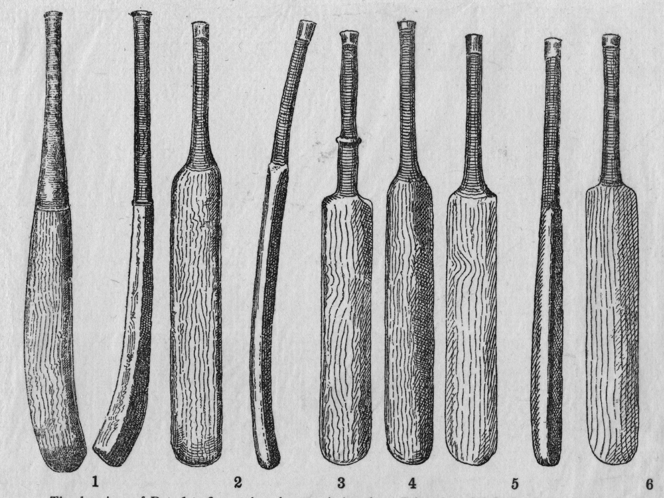 caption: Circa 1890: An illustration of a variety of types of old cricket bats.