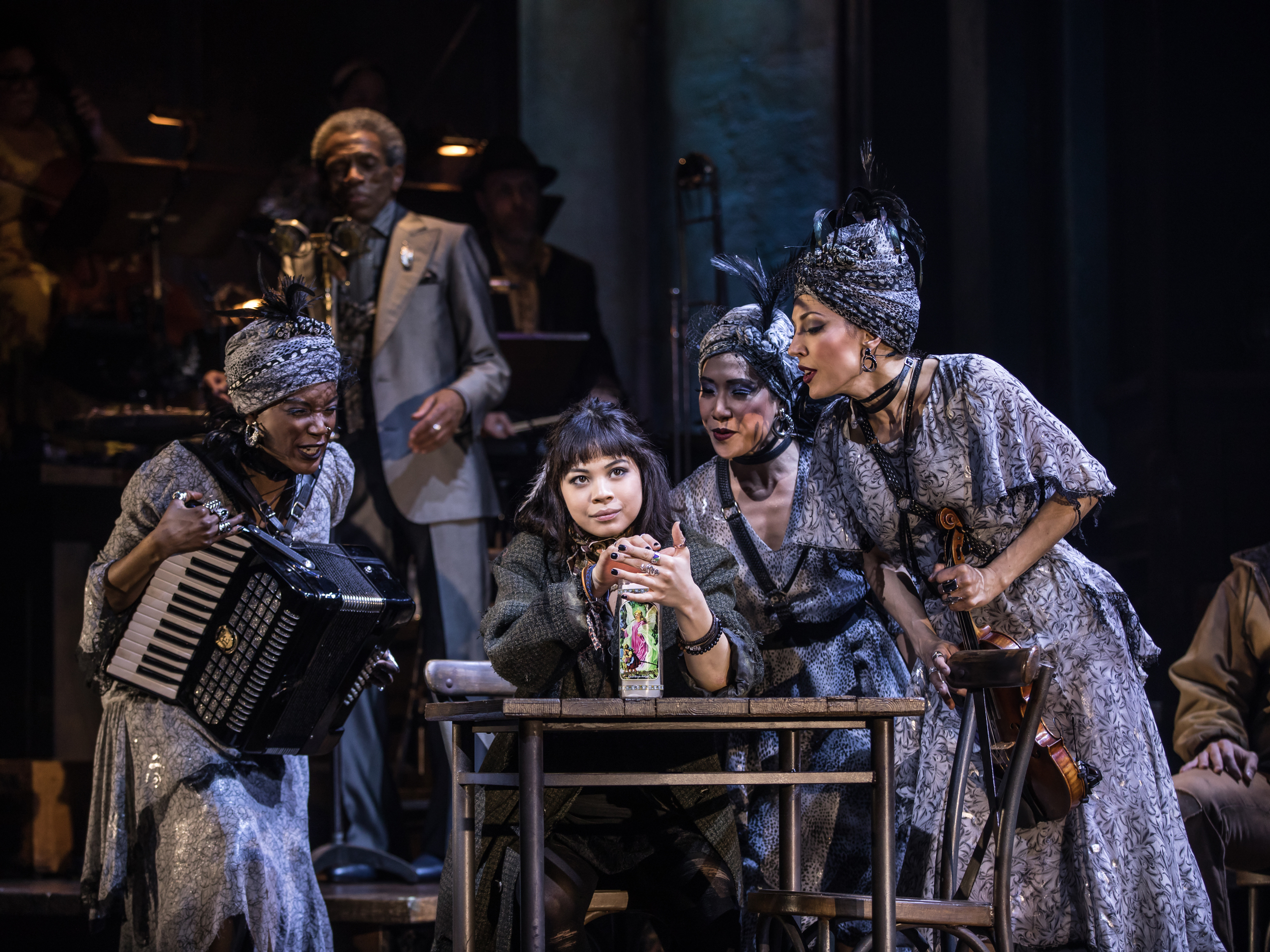 caption: Eva Noblezada, who plays Eurydice, and the Broadway cast of <em>Hadestown. </em>