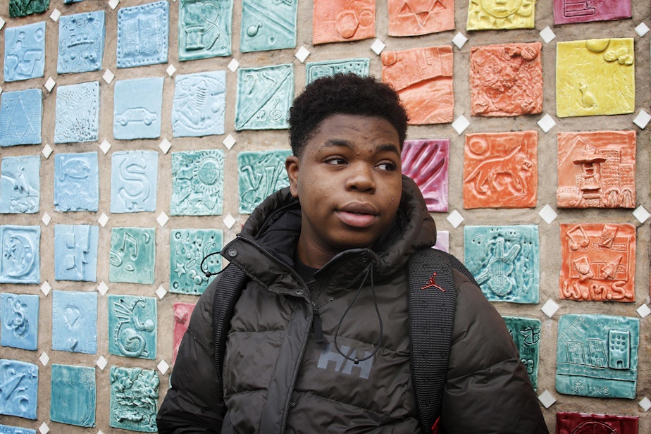 caption: Eighth-grader Jakwaun Shannon posed for a portrait outside of Washington Middle School on Feb. 12, 2020. Jakwaun says he was belittled by his math teacher, James Johnson. Johnson transferred to Washington from Meany Middle School, where he punched a child in the jaw.