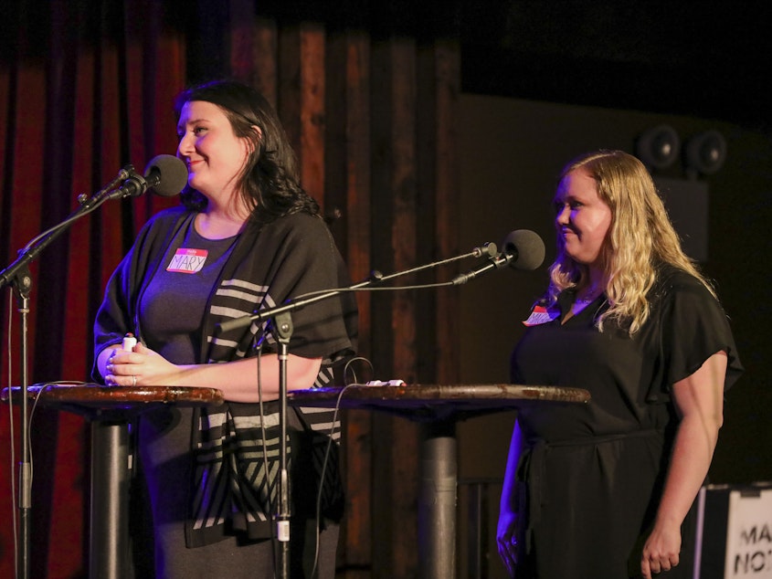 caption: Contestants compete in the final round <em>Ask Me Another</em> at the Bell House in Brooklyn, New York.