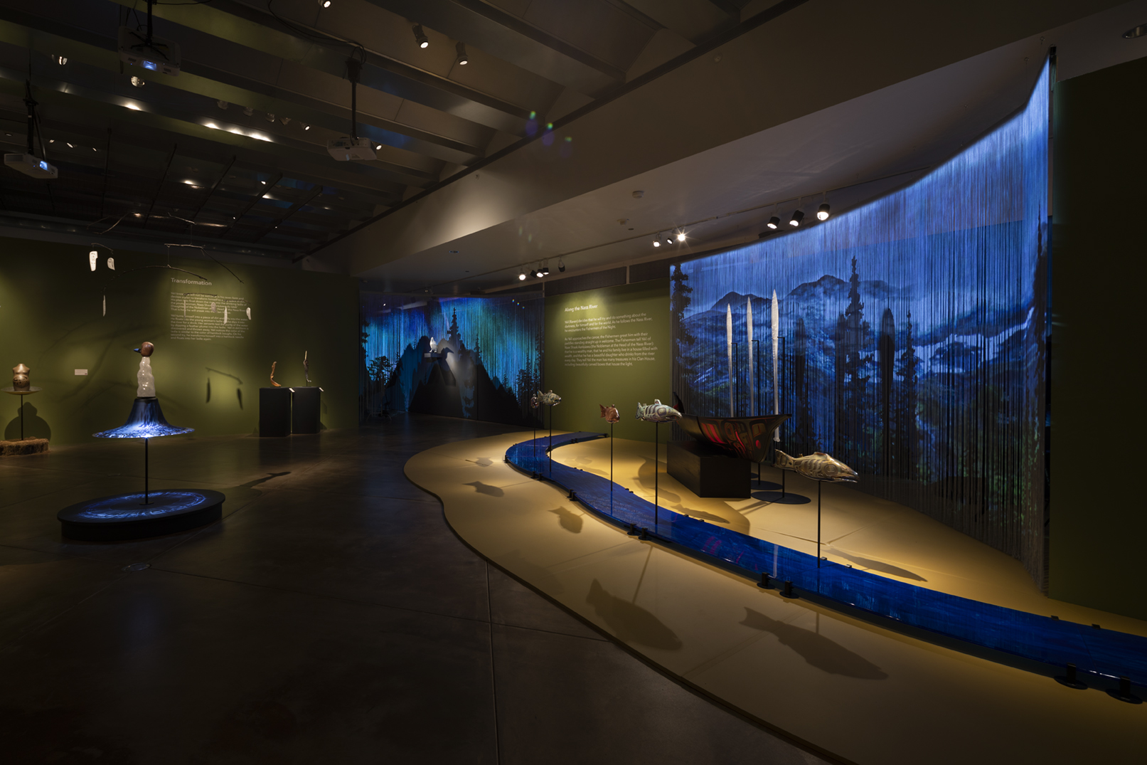 caption: The entry to Preston Singletary's "Raven and the Box of Daylight" at the Museum of Glass.