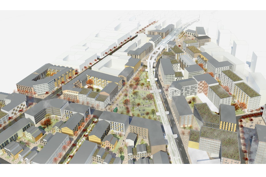 caption: From a 2017 presentation by then UW College of Built Environment graduate students Derek Holmer, Jouko Loikkanen, Yuansi Cai and Yinxi Shi. Students were charged with imagining what could be built using a "housing benefit district" model at the future Kent Des Moines light rail station.