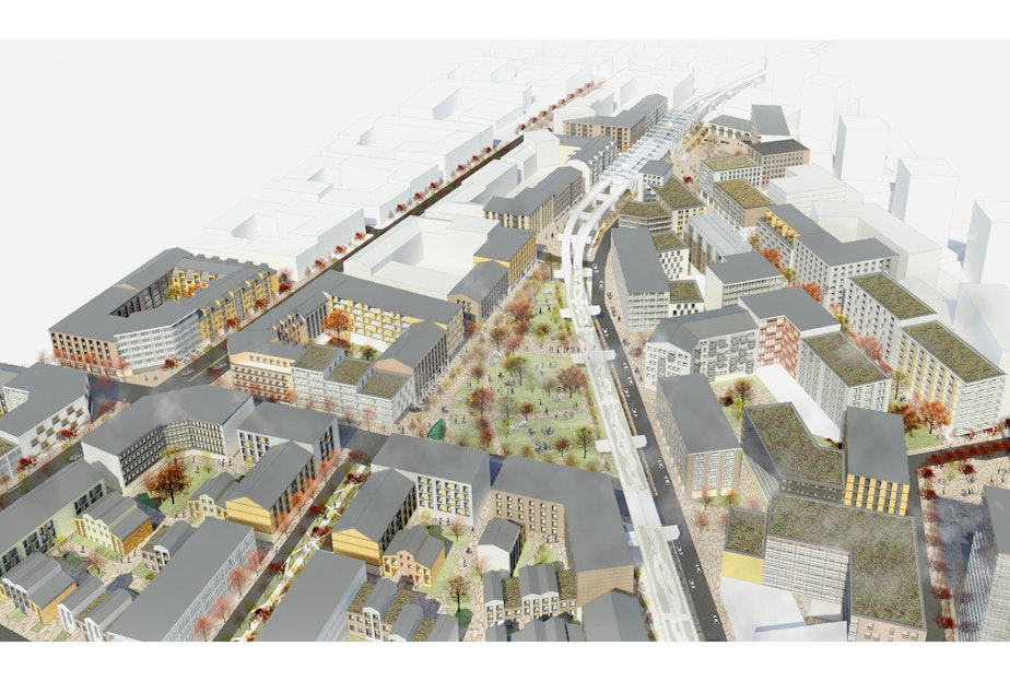 caption: From a 2017 presentation by then UW College of Built Environment graduate students Derek Holmer, Jouko Loikkanen, Yuansi Cai and Yinxi Shi. Students were charged with imagining what could be built using a "housing benefit district" model at the future Kent Des Moines light rail station.