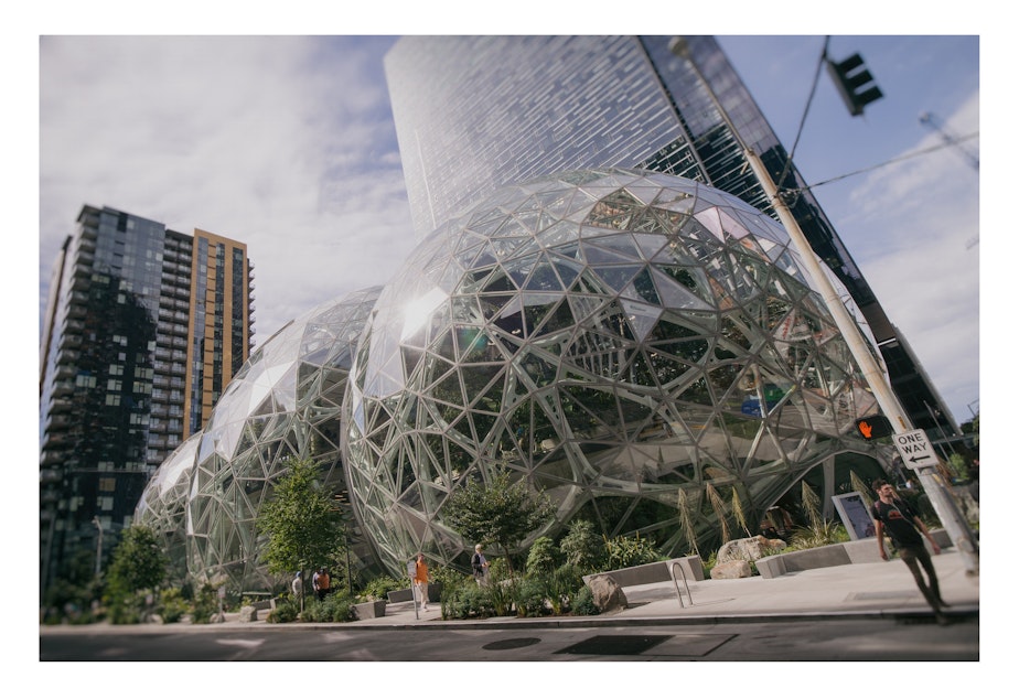 caption: The jewels of Seattle's Amazon campus could look like small fry compared to new East Coast sites.