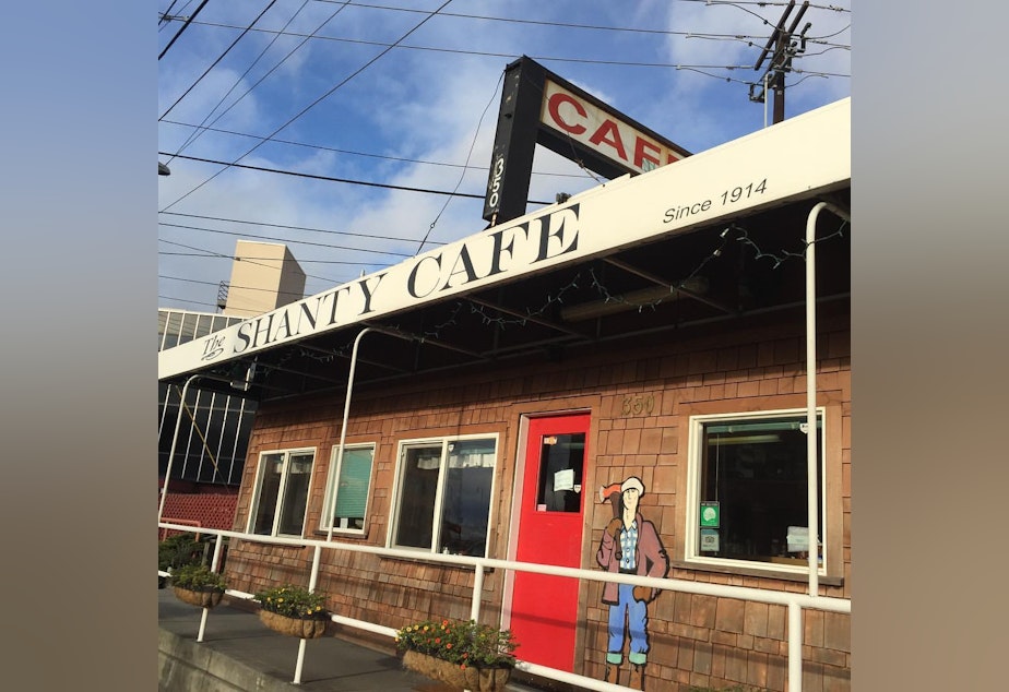 caption: Shanty Cafe on Elliott Ave. "The building was originally a pay station for dock workers, and became "Violet Shanty" restaurant in 1914 - and they have a menu from the '30s hanging inside." - @vanishingseattle