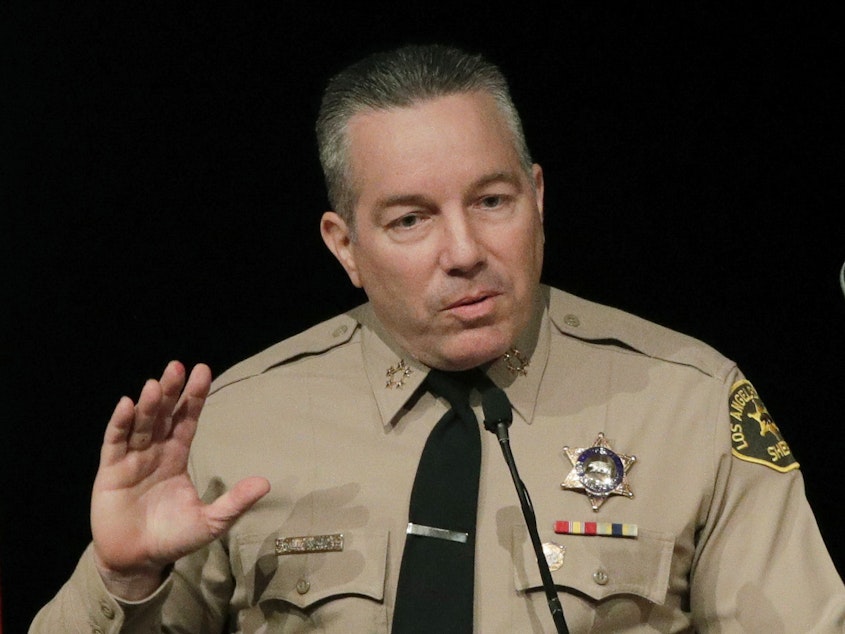 caption: Los Angeles County Sheriff Alex Villanueva tried to shut down gun shops, saying they were nonessential during California's statewide coronavirus stay at home order. He has now reversed course on that stance.