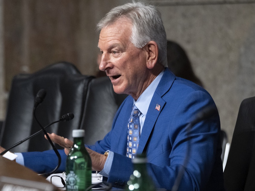 caption: Sen. Tommy Tuberville, R-Ala., says he is dropping his monthslong hold on most military promotions. He will continue to block promotions for four-star generals over his objections to a Pentagon abortion policy.