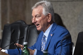 caption: Sen. Tommy Tuberville, R-Ala., says he is dropping his monthslong hold on most military promotions. He will continue to block promotions for four-star generals over his objections to a Pentagon abortion policy.