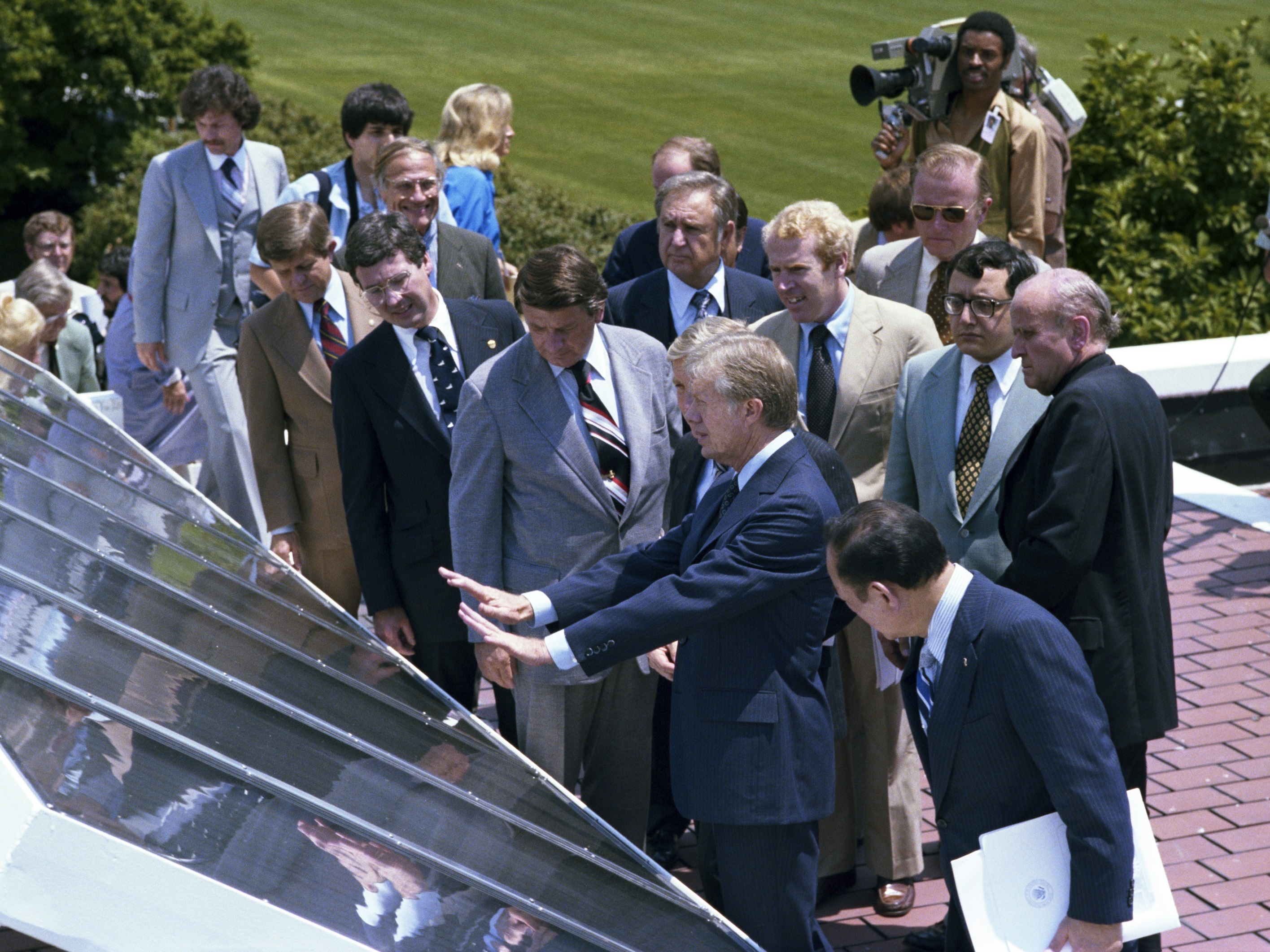 caption: Former President Jimmy Carter at the June 20, 1979 dedication ceremony for solar panels installed on the White House.