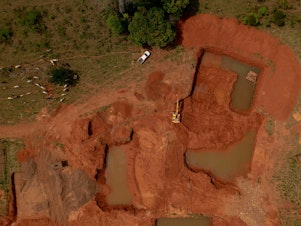 caption: An illegal gold mine in Brazil.