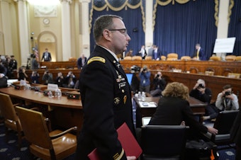 caption: Lt. Col. Alexander Vindman, departs after testifying before the House Intelligence Committee in November 2019.
