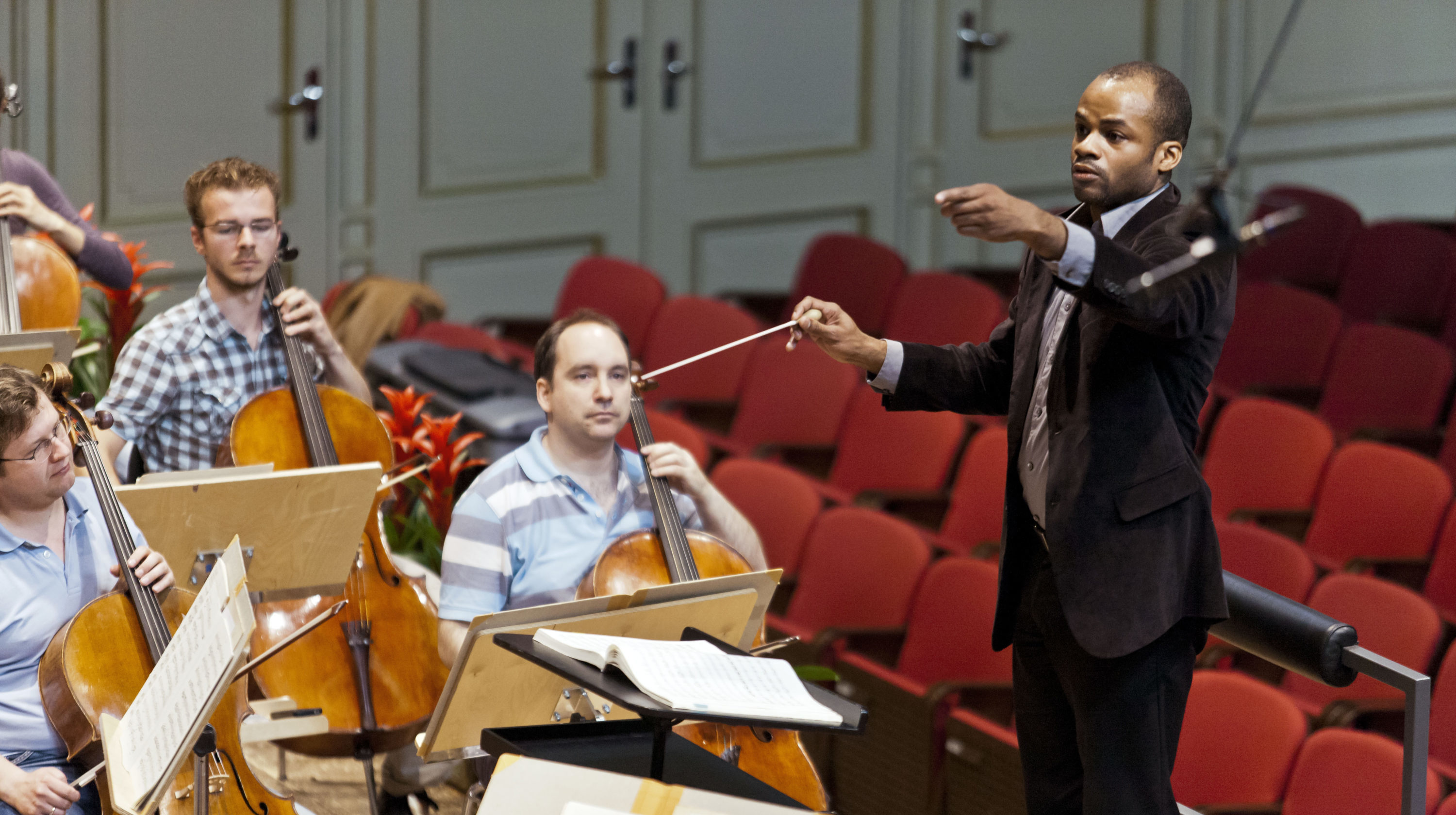 caption: Conductor Brandon Keith Brown at work. (Courtesy)