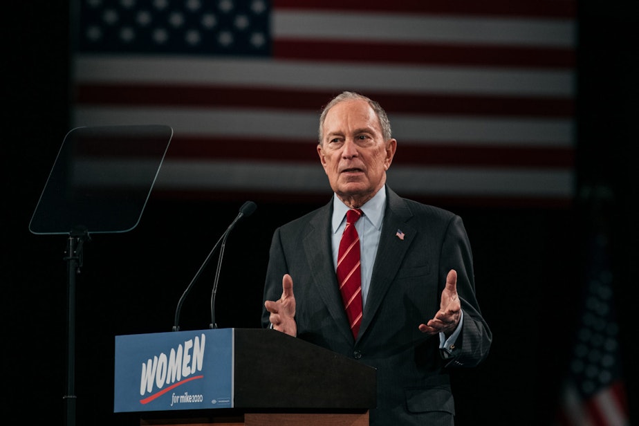 caption: 2020 Democratic presidential candidate Mike Bloomberg speaks at a rally in New York City. (Scott Heins/Getty Images)
