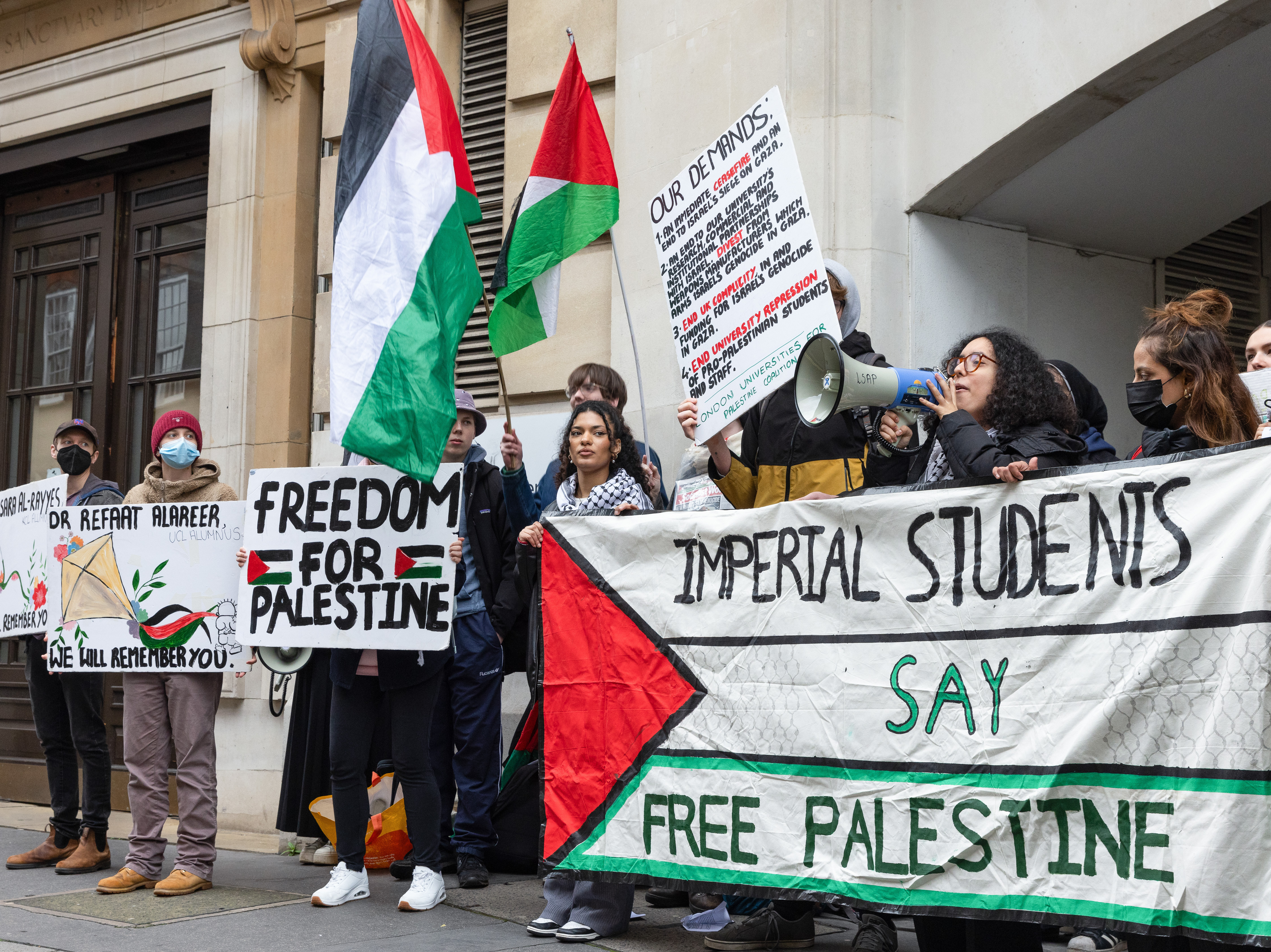 caption: Pro-Palestinian students protest outside the Department for Education on March 22 in London. The students called for an immediate cease-fire in Gaza and for an end to links between U.K. universities and Israel.