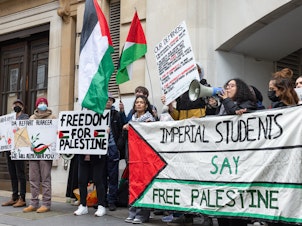 caption: Pro-Palestinian students protest outside the Department for Education on March 22 in London. The students called for an immediate cease-fire in Gaza and for an end to links between U.K. universities and Israel.