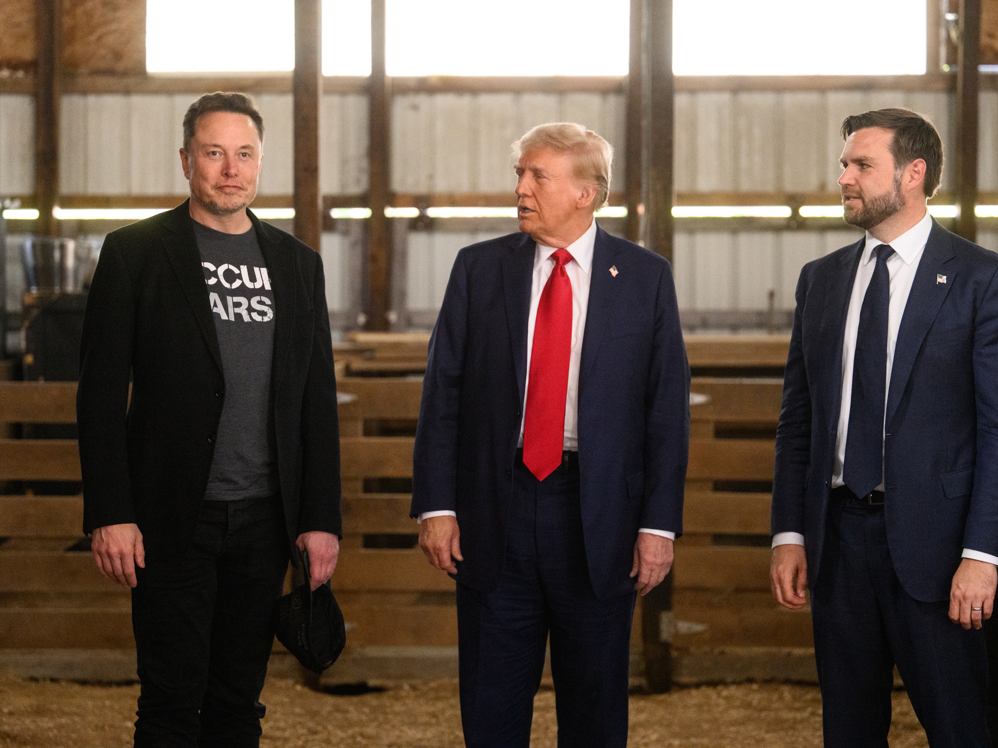 caption: President Donald Trump, center, and Vice President JD Vance, right, and Elon Musk met backstage prior to a presidential campaign event at the Butler Farm Show in Butler, Pa., on Oct. 5, 2024.
