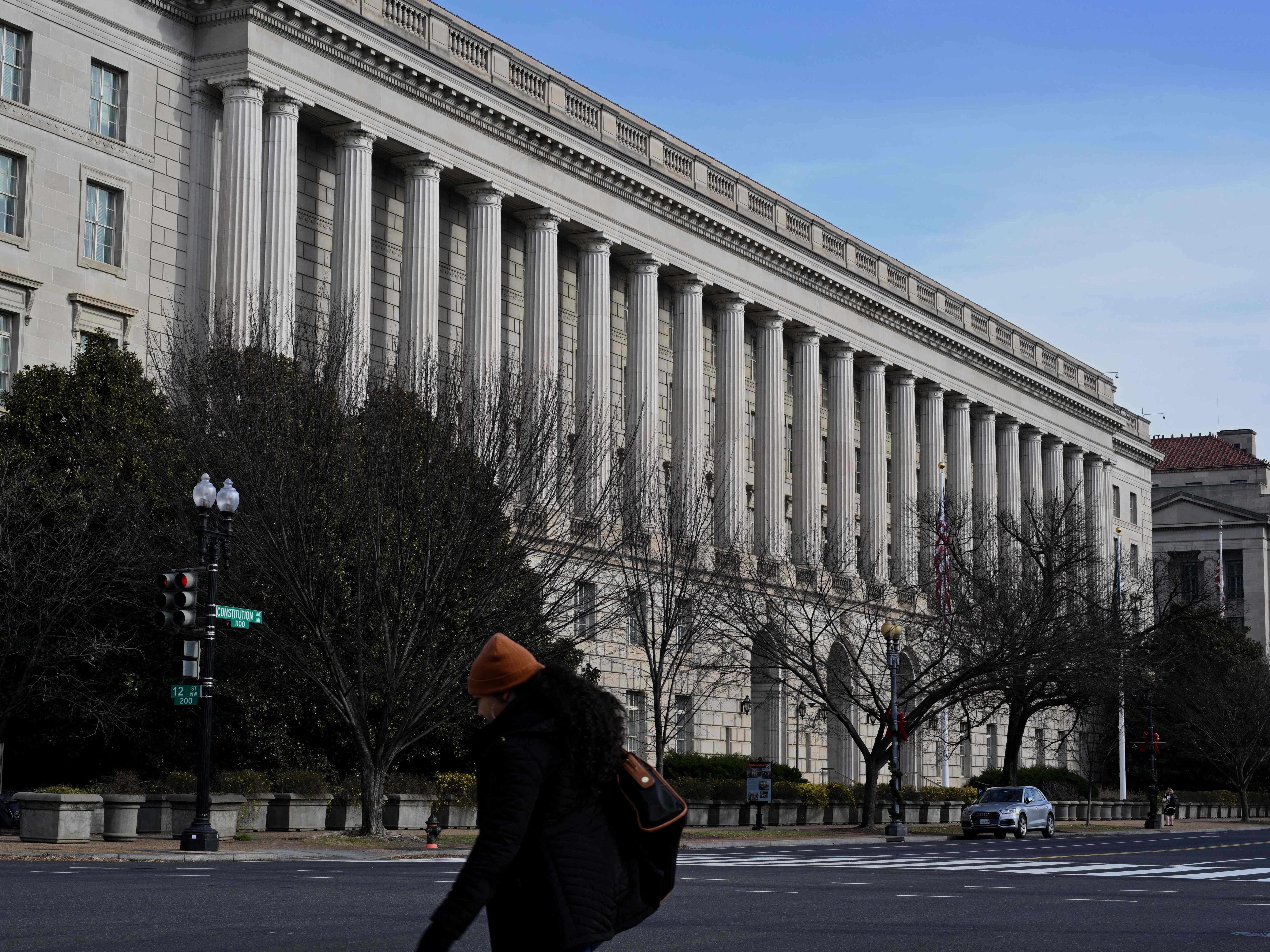 caption: The IRS says people who got money from special rebates and payments from their states should wait to file tax returns if they're not sure if the money is taxable. The IRS headquarters building in Washington, D.C., is seen here on Jan. 10.