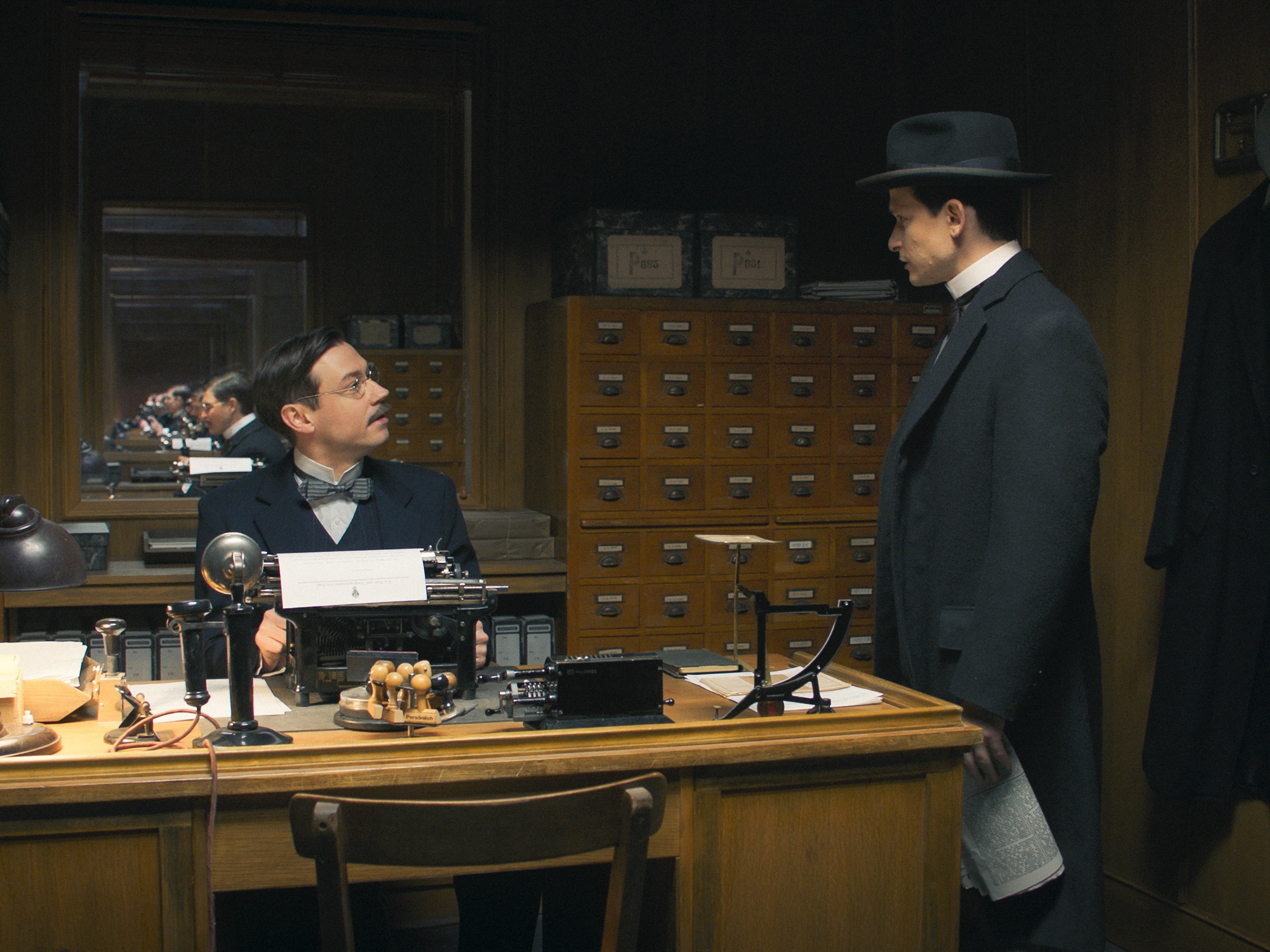 caption: Max Brod (left), a recognized writer at the time, relentlessly promoted the writings of his friend, Franz Kafka, played here respectively by David Kross and Joel Basman in the Austrian-German series <em>Kafka</em>, now streaming in the U.S.