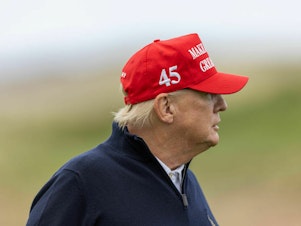caption: Former President Donald Trump is pictured during a round of golf on May 2 in Turnberry, Scotland. On Friday, the Justice Department special counsel announced that Trump has been indicted related to the handling of classified documents.