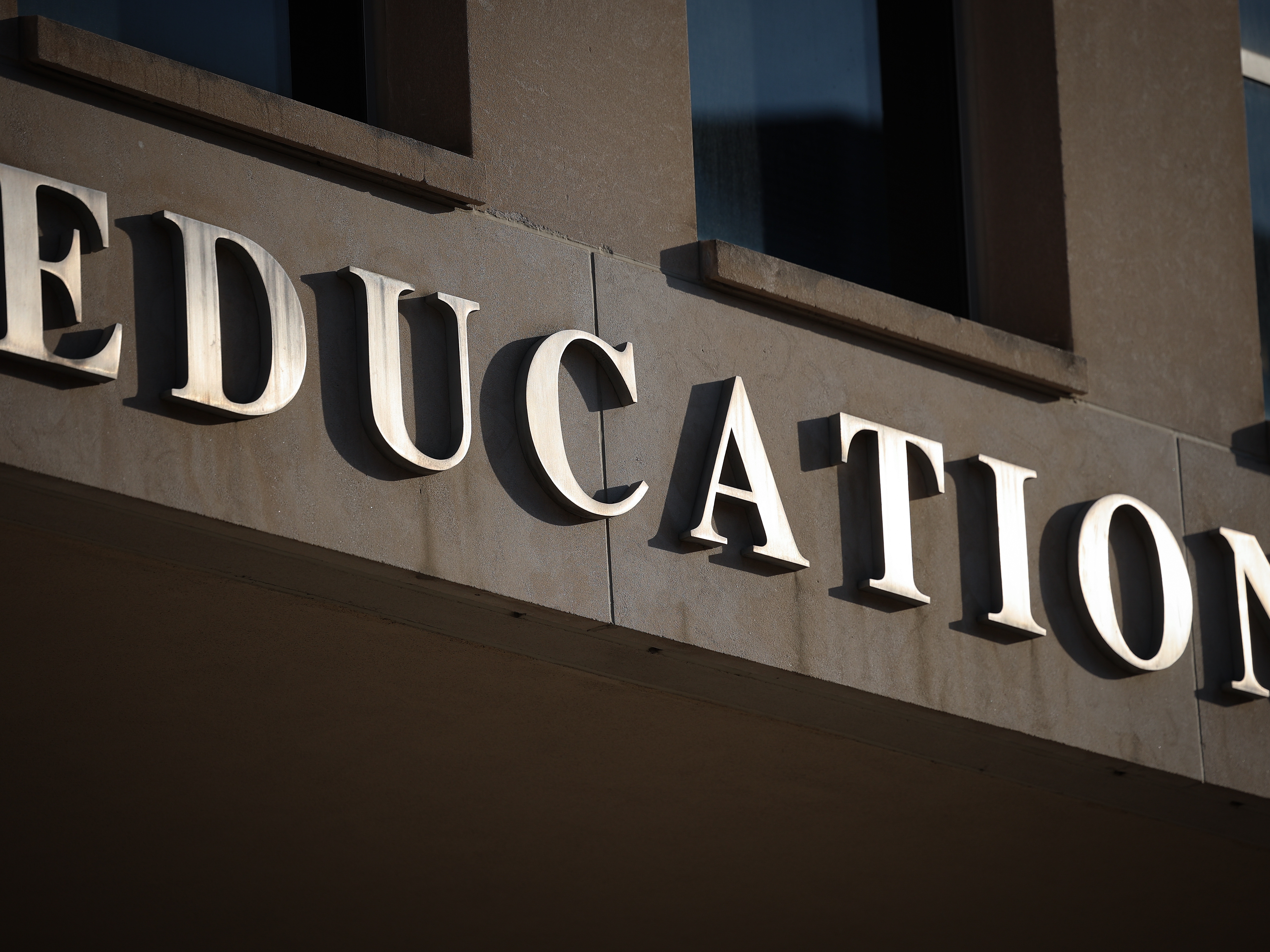 caption: The headquarters of the U.S. Department of Education shown on March 12, after the Trump administration announced mass layoffs.
