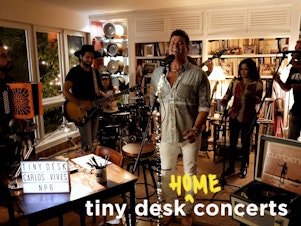 caption: Carlos Vives plays a Tiny Desk (home) concert.
