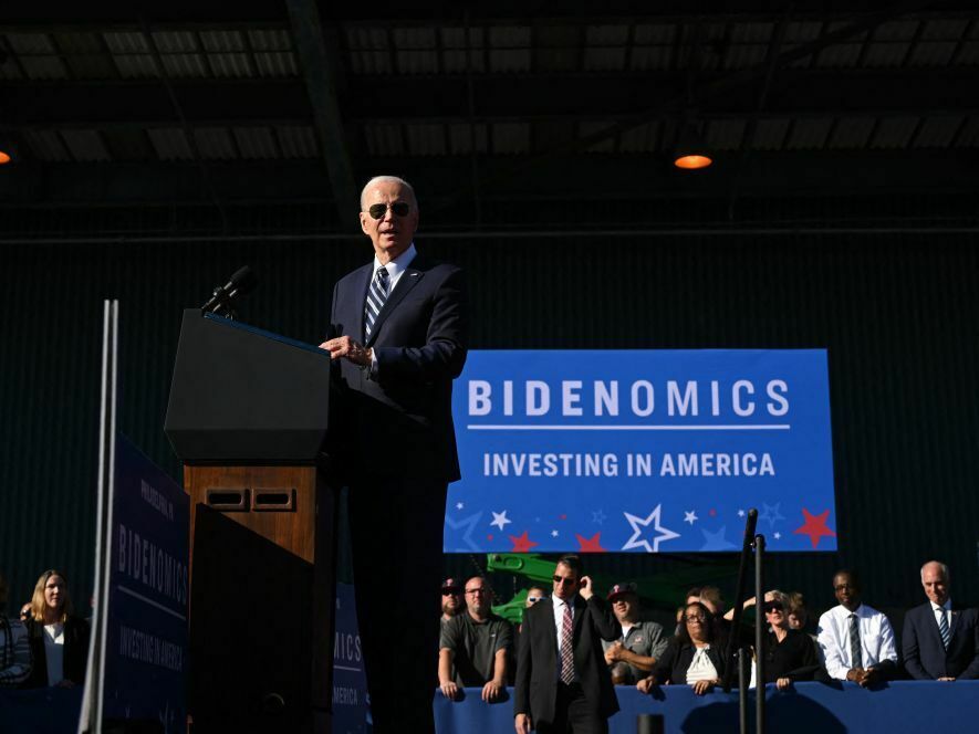 caption: President Joe Biden speaks about his Bidenomics agenda at Tioga Marine Terminal in Philadelphia, Pennsylvania, on October 13, 2023.