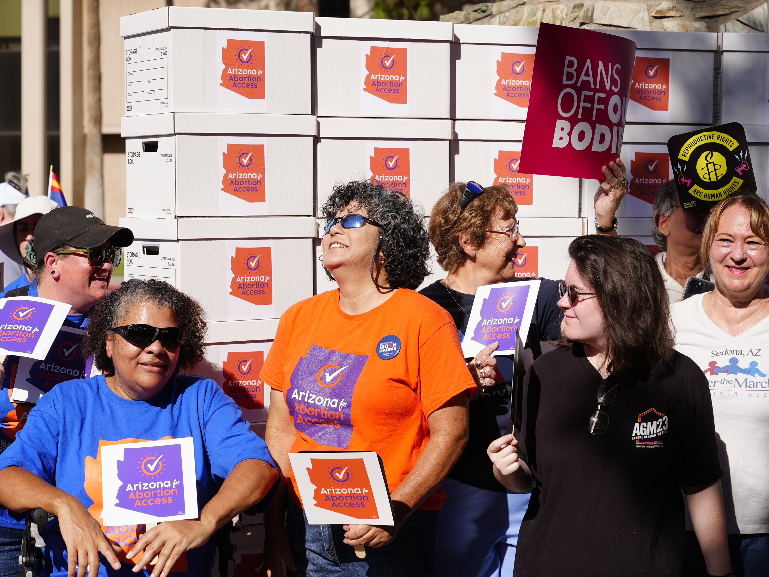 caption: Arizona abortion-rights supporters gather for a news conference prior to delivering more than 800,000 petition signatures to the state Capitol to get abortion rights on the November general election ballot, July 3, 2024, in Phoenix.